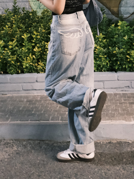 翅膀圖案水洗牛仔褲