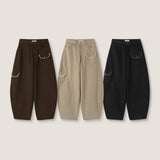 #26 不規則口袋拼色彎刀褲